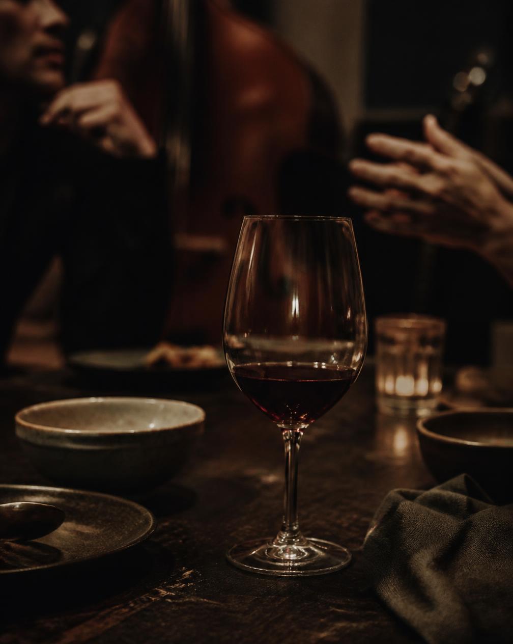 A half-empty glass at the end of dinner